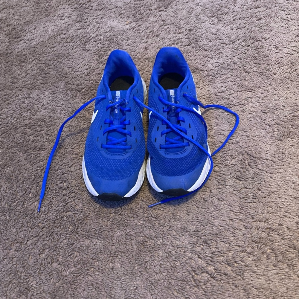 Nike tennis shoes, size youth 6, blue